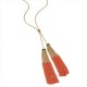 Long gold necklace with orange tassels